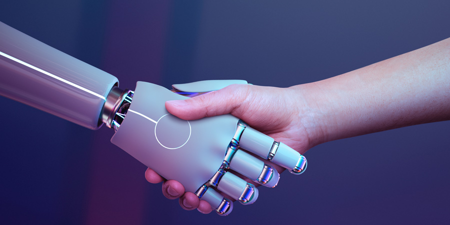 Cumprimentos de mãos entre uma mão humana e outra robótica